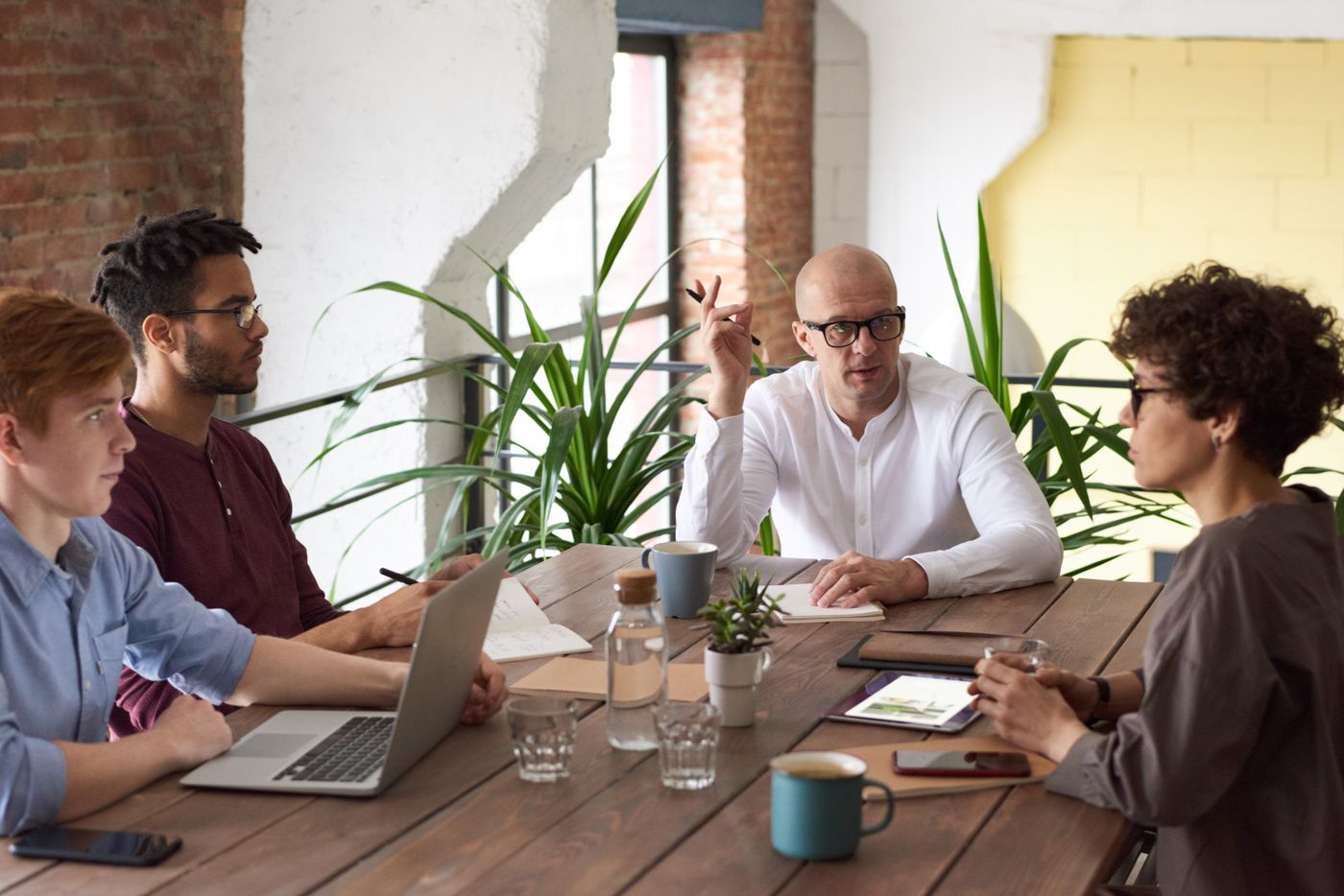 Recruitment team discussing candidate pipeline